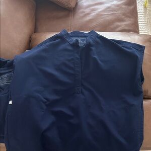 2 sets of navy fig scrubs